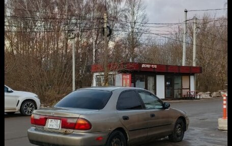 Mazda Protege, 1998 год, 160 000 рублей, 12 фотография