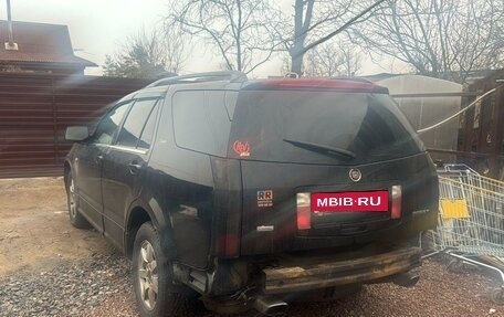 Cadillac SRX II рестайлинг, 2007 год, 450 000 рублей, 2 фотография