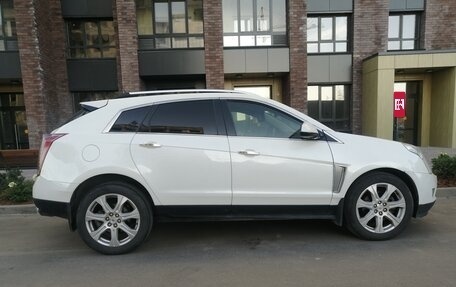 Cadillac SRX II рестайлинг, 2014 год, 1 280 000 рублей, 18 фотография