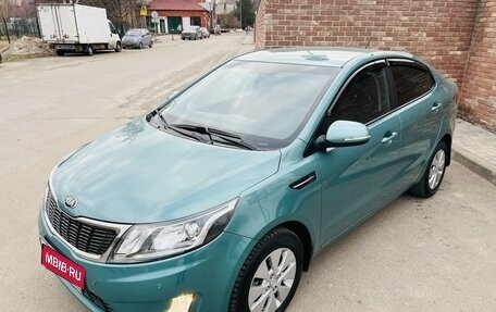 KIA Rio III рестайлинг, 2013 год, 985 000 рублей, 1 фотография