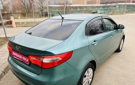 KIA Rio III рестайлинг, 2013 год, 985 000 рублей, 9 фотография