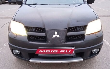 Mitsubishi Outlander III рестайлинг 3, 2007 год, 600 000 рублей, 4 фотография