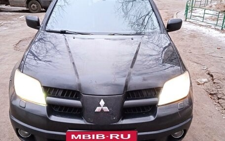 Mitsubishi Outlander III рестайлинг 3, 2007 год, 600 000 рублей, 19 фотография