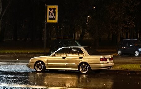 Nissan Sunny, 1992 год, 360 000 рублей, 10 фотография