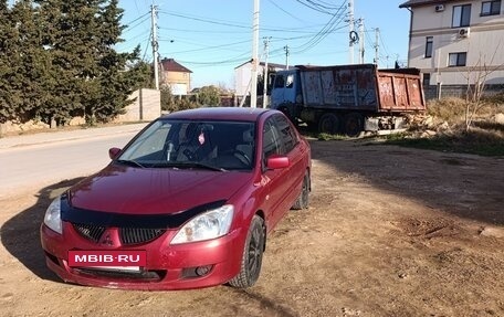 Mitsubishi Lancer IX, 2005 год, 390 000 рублей, 2 фотография