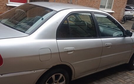 Mitsubishi Lancer VII, 1998 год, 369 000 рублей, 3 фотография