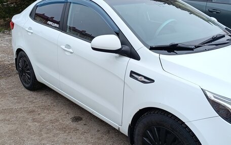 KIA Rio III рестайлинг, 2011 год, 700 000 рублей, 3 фотография