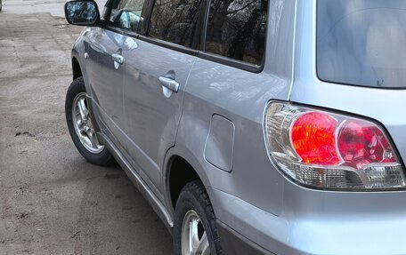 Mitsubishi Outlander III рестайлинг 3, 2004 год, 800 000 рублей, 23 фотография