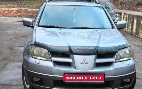 Mitsubishi Outlander III рестайлинг 3, 2004 год, 800 000 рублей, 11 фотография