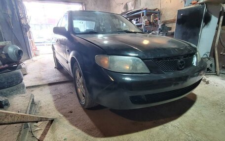 Mazda Protege, 2001 год, 285 000 рублей, 9 фотография