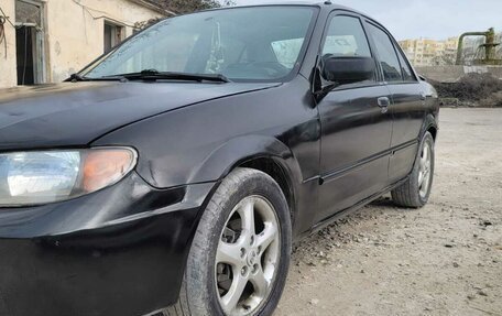 Mazda Protege, 2001 год, 285 000 рублей, 12 фотография