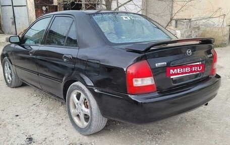 Mazda Protege, 2001 год, 285 000 рублей, 13 фотография