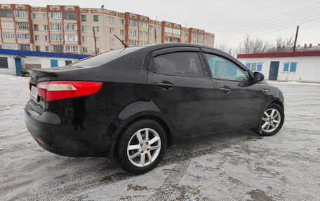 KIA Rio III рестайлинг, 2014 год, 678 000 рублей, 16 фотография