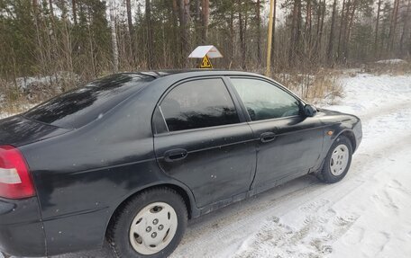 KIA Shuma I, 1998 год, 140 000 рублей, 4 фотография