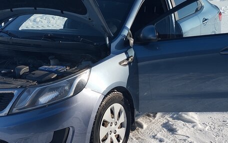 KIA Rio III рестайлинг, 2013 год, 690 000 рублей, 1 фотография