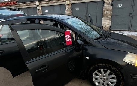 Nissan Tiida, 2010 год, 570 000 рублей, 5 фотография