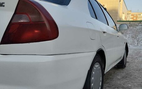 Mitsubishi Mirage VI рестайлинг, 1998 год, 250 000 рублей, 11 фотография