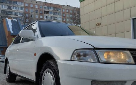 Mitsubishi Mirage VI рестайлинг, 1998 год, 250 000 рублей, 13 фотография