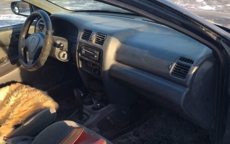 Mazda 323, 1997 год, 340 000 рублей, 2 фотография