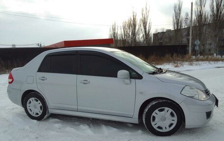 Nissan Tiida, 2010 год, 860 000 рублей, 1 фотография