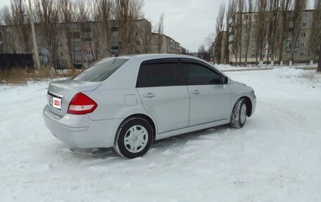 Nissan Tiida, 2010 год, 860 000 рублей, 6 фотография