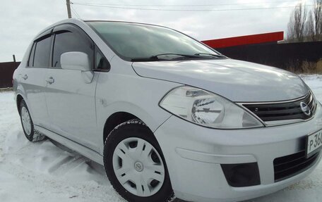 Nissan Tiida, 2010 год, 860 000 рублей, 3 фотография