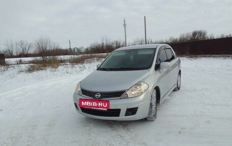 Nissan Tiida, 2010 год, 860 000 рублей, 14 фотография