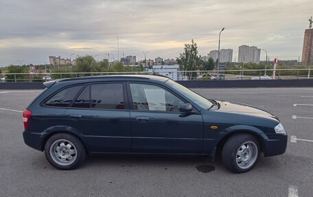 Mazda 323, 2000 год, 340 000 рублей, 13 фотография