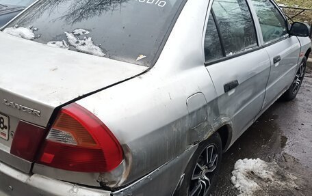 Mitsubishi Lancer VII, 1999 год, 120 000 рублей, 2 фотография