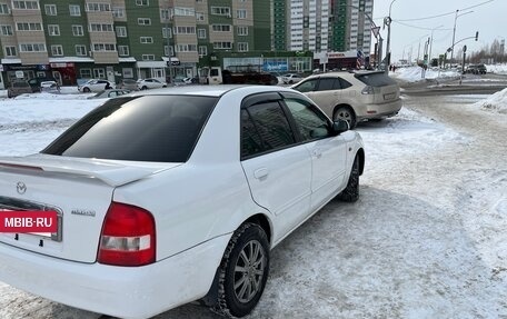 Mazda Familia, 2001 год, 380 000 рублей, 5 фотография