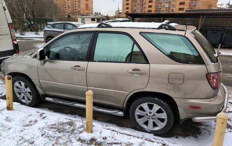 Lexus RX IV рестайлинг, 2000 год, 790 000 рублей, 8 фотография