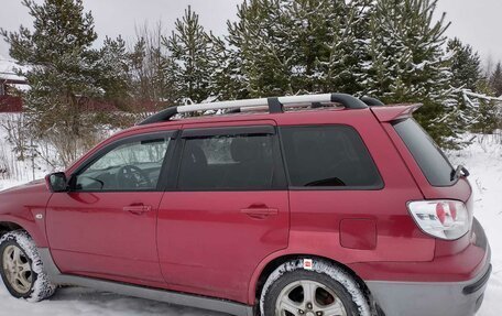 Mitsubishi Outlander III рестайлинг 3, 2004 год, 670 000 рублей, 4 фотография