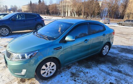 KIA Rio III рестайлинг, 2012 год, 785 000 рублей, 9 фотография