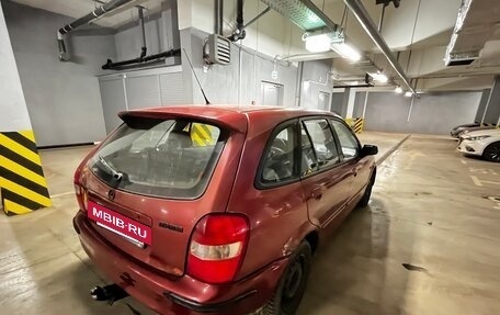 Mazda 323, 2002 год, 210 000 рублей, 9 фотография