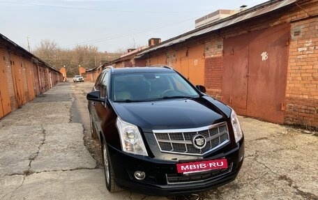 Cadillac SRX II рестайлинг, 2011 год, 1 590 000 рублей, 2 фотография