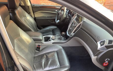 Cadillac SRX II рестайлинг, 2011 год, 1 590 000 рублей, 18 фотография
