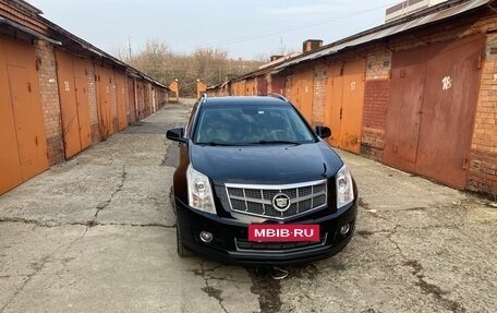 Cadillac SRX II рестайлинг, 2011 год, 1 590 000 рублей, 27 фотография