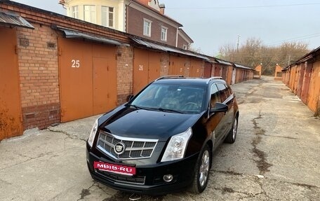 Cadillac SRX II рестайлинг, 2011 год, 1 590 000 рублей, 26 фотография