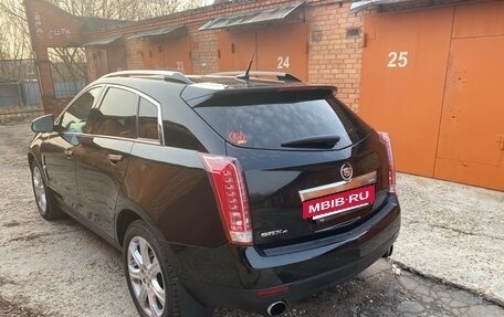 Cadillac SRX II рестайлинг, 2011 год, 1 590 000 рублей, 32 фотография
