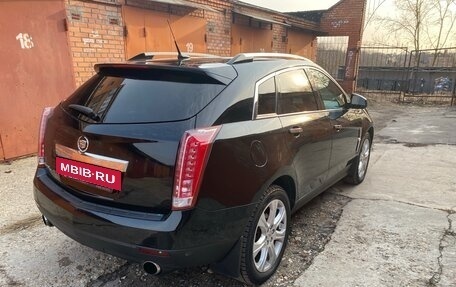 Cadillac SRX II рестайлинг, 2011 год, 1 590 000 рублей, 34 фотография