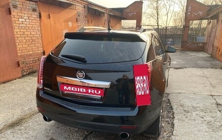 Cadillac SRX II рестайлинг, 2011 год, 1 590 000 рублей, 33 фотография
