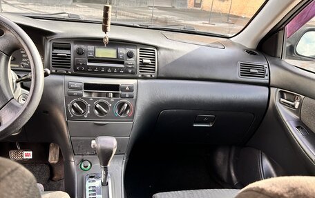 Toyota Corolla, 2004 год, 570 000 рублей, 11 фотография