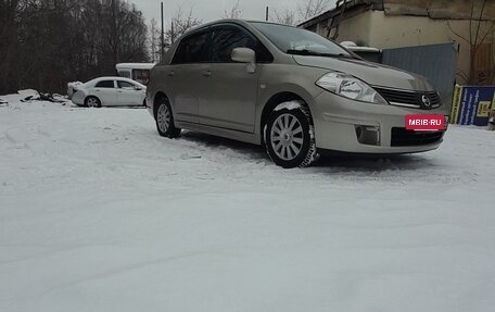 Nissan Tiida, 2010 год, 660 000 рублей, 7 фотография