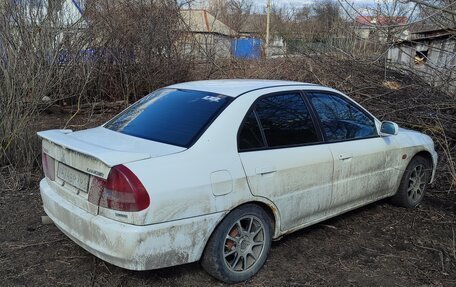 Mitsubishi Lancer VII, 1996 год, 300 000 рублей, 3 фотография