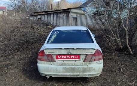 Mitsubishi Lancer VII, 1996 год, 300 000 рублей, 5 фотография