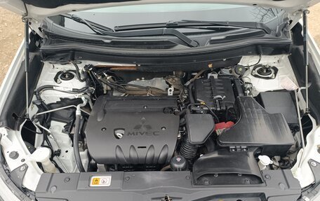 Mitsubishi Outlander III рестайлинг 3, 2015 год, 1 700 000 рублей, 9 фотография