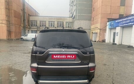 Mitsubishi Outlander III рестайлинг 3, 2012 год, 1 590 000 рублей, 4 фотография