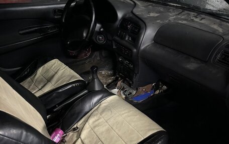 Mazda 323, 1996 год, 100 000 рублей, 4 фотография