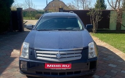 Cadillac SRX II рестайлинг, 2009 год, 600 000 рублей, 1 фотография