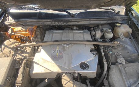 Cadillac SRX II рестайлинг, 2009 год, 600 000 рублей, 19 фотография